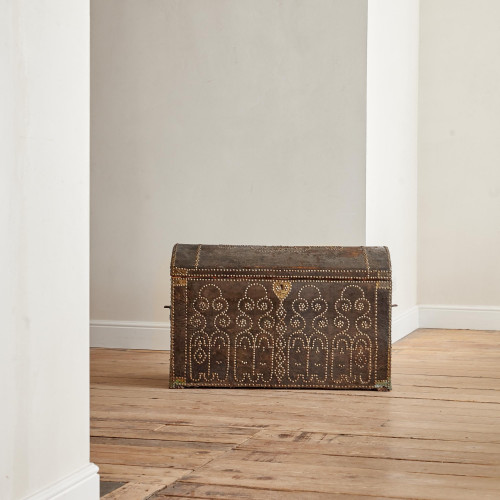 A black leather studded domed trunk