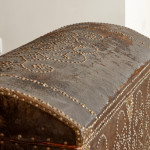 A black leather studded domed trunk