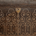 A black leather studded domed trunk
