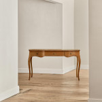 A Louis XV style oak bureau plat en arbalète