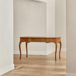 A Louis XV style oak bureau plat en arbalète