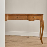 A Louis XV style oak bureau plat en arbalète