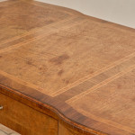 A Louis XV style oak bureau plat en arbalète