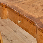 A Louis XV style oak bureau plat en arbalète
