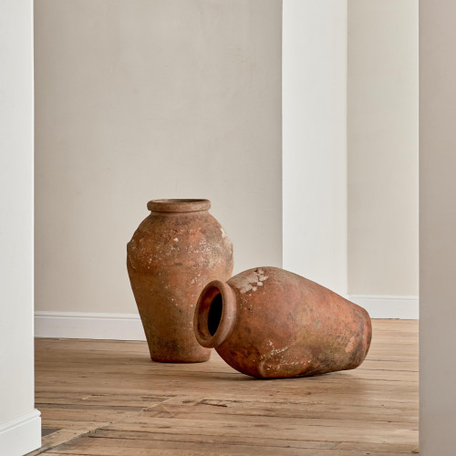 A pair of Montelupo terracotta oil jars by Carlo Bitossi