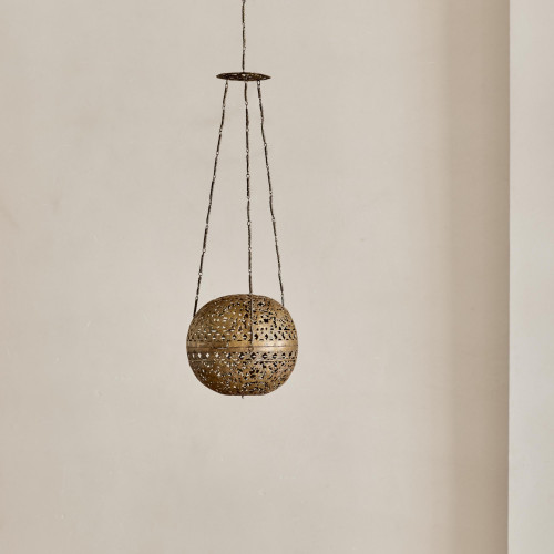 A brass shadow ball pendant