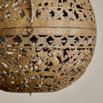 A brass shadow ball pendant