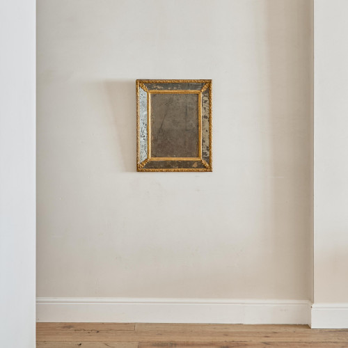 A Regence period rectangular giltwood border glass mirror