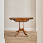 A Regency satinwood pembroke table