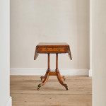 A Regency satinwood pembroke table