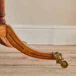 A Regency satinwood pembroke table