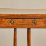 A Regency satinwood pembroke table