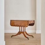 A Regency satinwood pembroke table