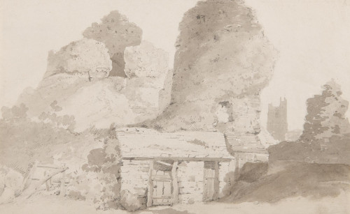A view of Launceston Castle with the tower of St Mary's Magdalene in the distance