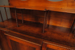 A Pair of rosewood and brass inlaid breakfront side cabinets