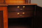 A Pair of rosewood and brass inlaid breakfront side cabinets