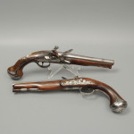 A fine pair of silver mounted holster pistols by Collumbell