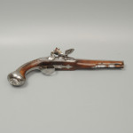 A fine pair of silver mounted holster pistols by Collumbell