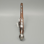 A fine pair of silver mounted holster pistols by Collumbell