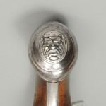 A fine pair of silver mounted holster pistols by Collumbell