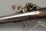 A fine pair of silver mounted holster pistols by Collumbell