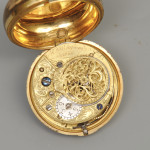 Pair cased 18th century pocket watch in horn back painted case