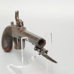 A pair of boxlock percussion pistols with flick bayonets