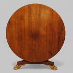 A Regency rosewood and parcel gilt centre table