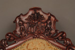 Armorial carved mahogany armchair