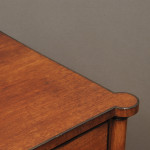 A Regency mahogany chest with ebony cock beadings