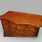 A fine and unusual Lancashire mahogany serpentine chest