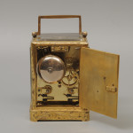 An early carriage clock in a gilt-engraved gorge case