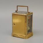 An early carriage clock in a gilt-engraved gorge case