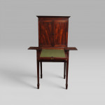 A George III period mahogany writing cabinet on stand