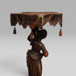 A Venetian carved and polychromed Blackamoor table