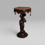 A Venetian carved and polychromed Blackamoor table