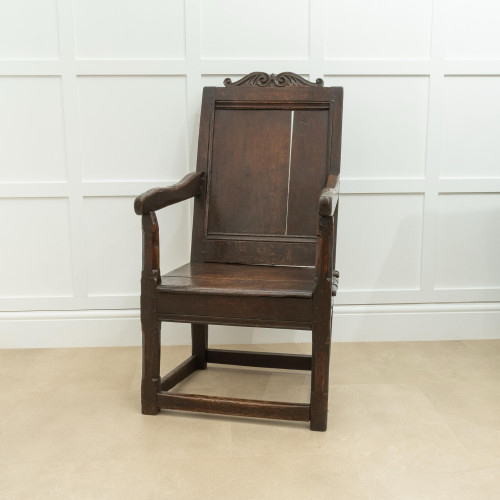 A Charles I oak panel-back open armchair, Gloucestershire/Welsh borders, circa 1640