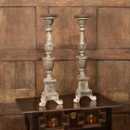 A pair of giltwood and painted pricket candlesticks, Italian, circa 1800