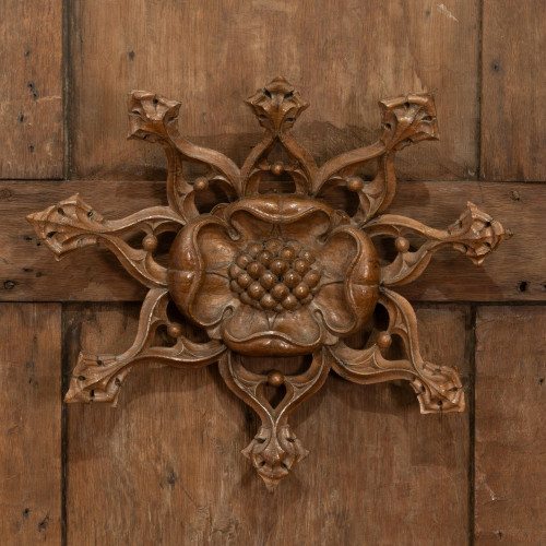 A Gothic Revival carved oak architectural mount, English