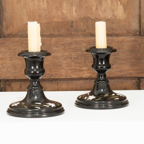 A pair of Victorian Ashford black 'marble' candlesticks, Derbyshire, circa 1850