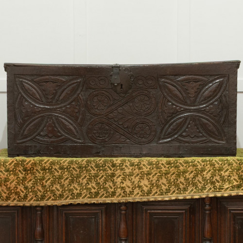 A rare Elizabeth I/James I carved oak and painted boarded box, West Country, circa 1600-20