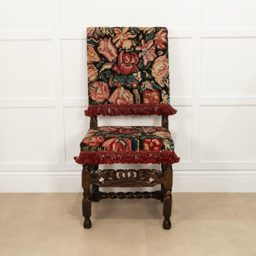 A Charles II oak and turkeywork upholstered chair, circa 1680