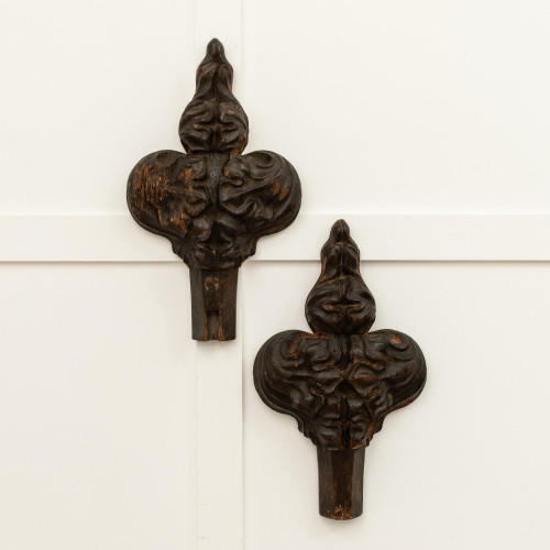 A 15th century carved oak poppy head pew-finial, circa 1450-1500