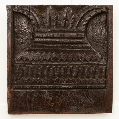 A Henry VIII carved oak panel, circa 1520