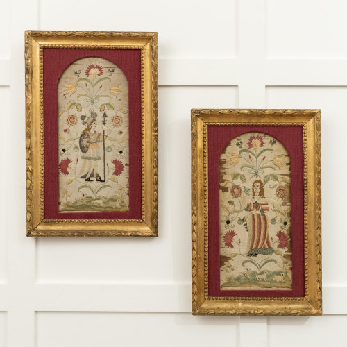 A pair of 18th century embroidered silk pictures, circa 1700-30