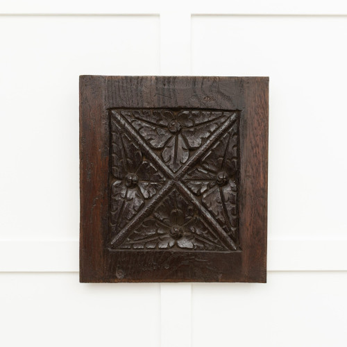 A Henry VIII carved oak panel, circa 1520