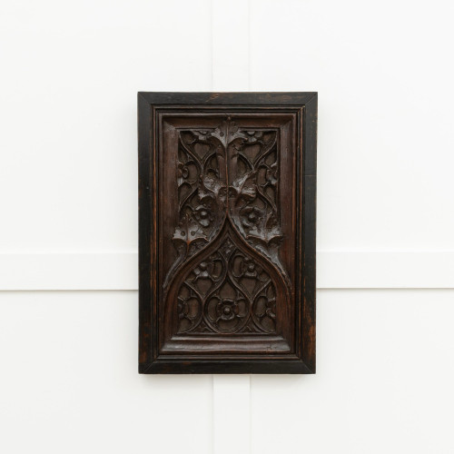 A 15th century carved oak tracery panel, circa 1450-80
