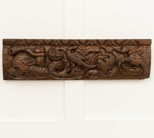 A carved oak rail, Flemish, circa 1640