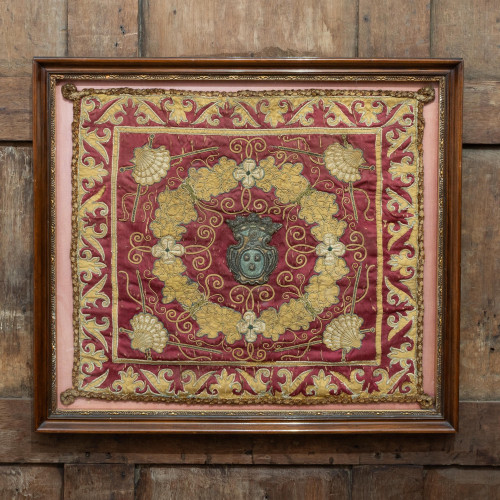 A needlework and appliqué silk cushion cover, Italian or possibly Spanish, circa 1600-40