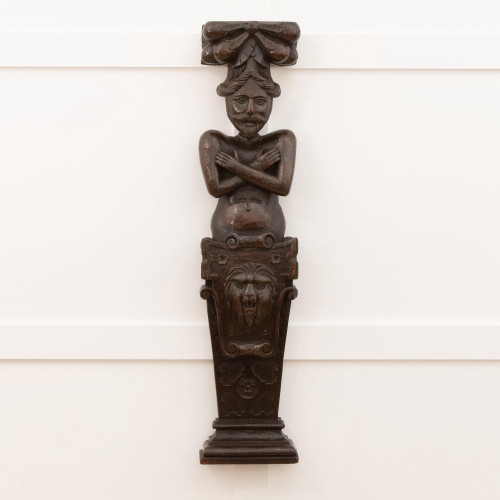 A good and large James I carved oak term, circa 1610